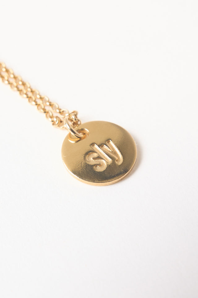 Sly pendant necklace
