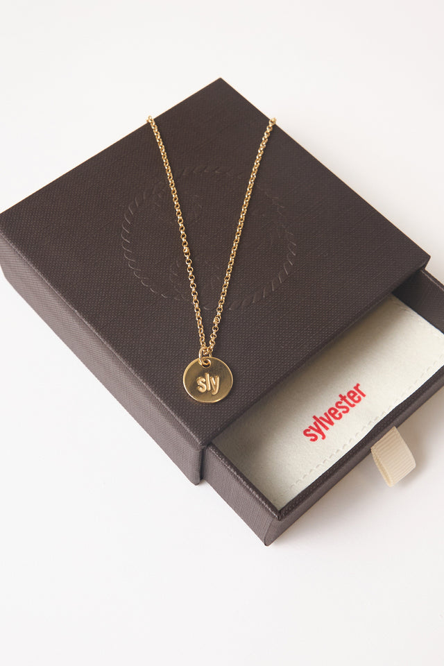 Sly pendant necklace