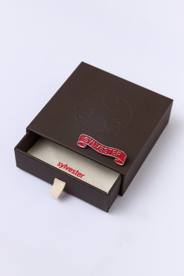 Sylvester scroll pin