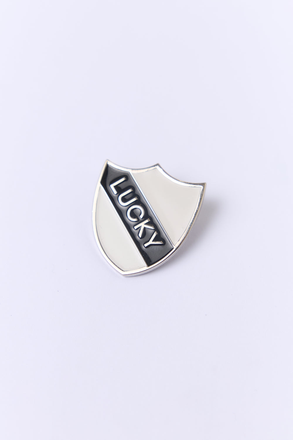 Lucky shield pin