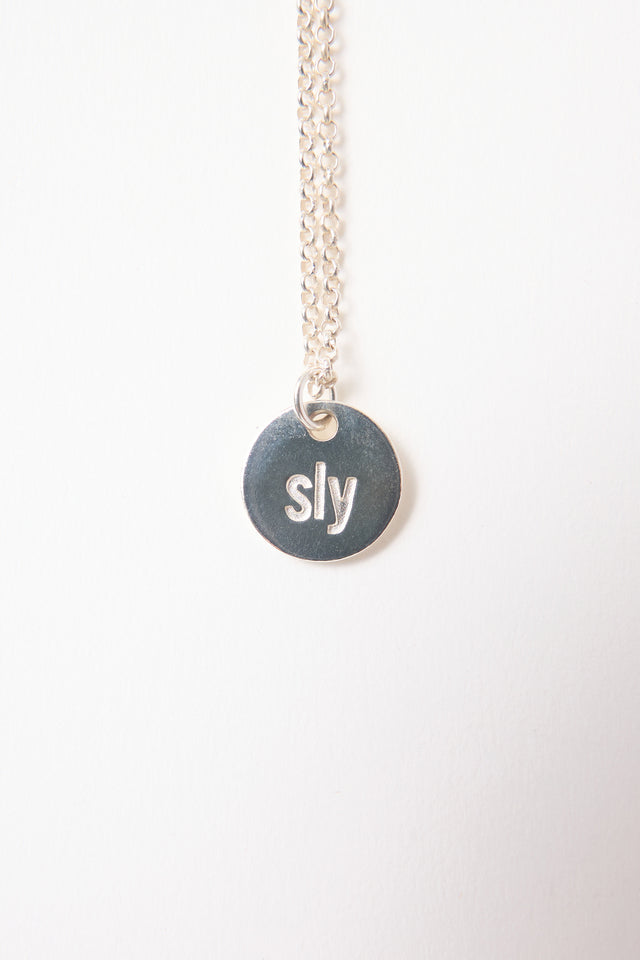 Sly pendant necklace