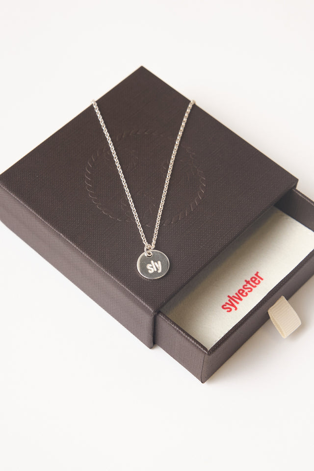 Sly pendant necklace
