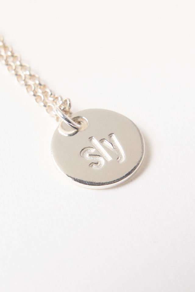 Sly pendant necklace