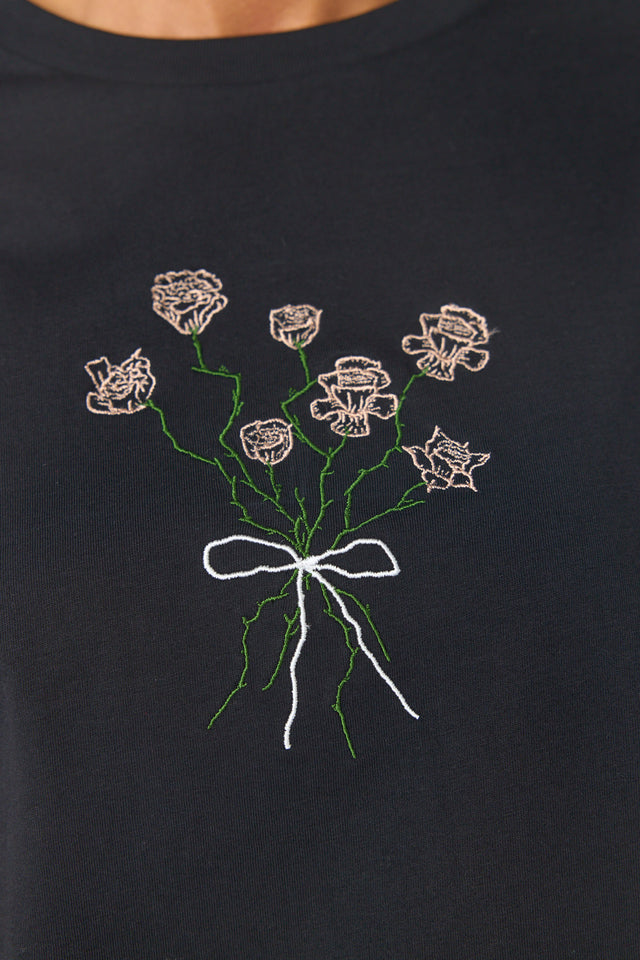 Tom's rose t-shirt